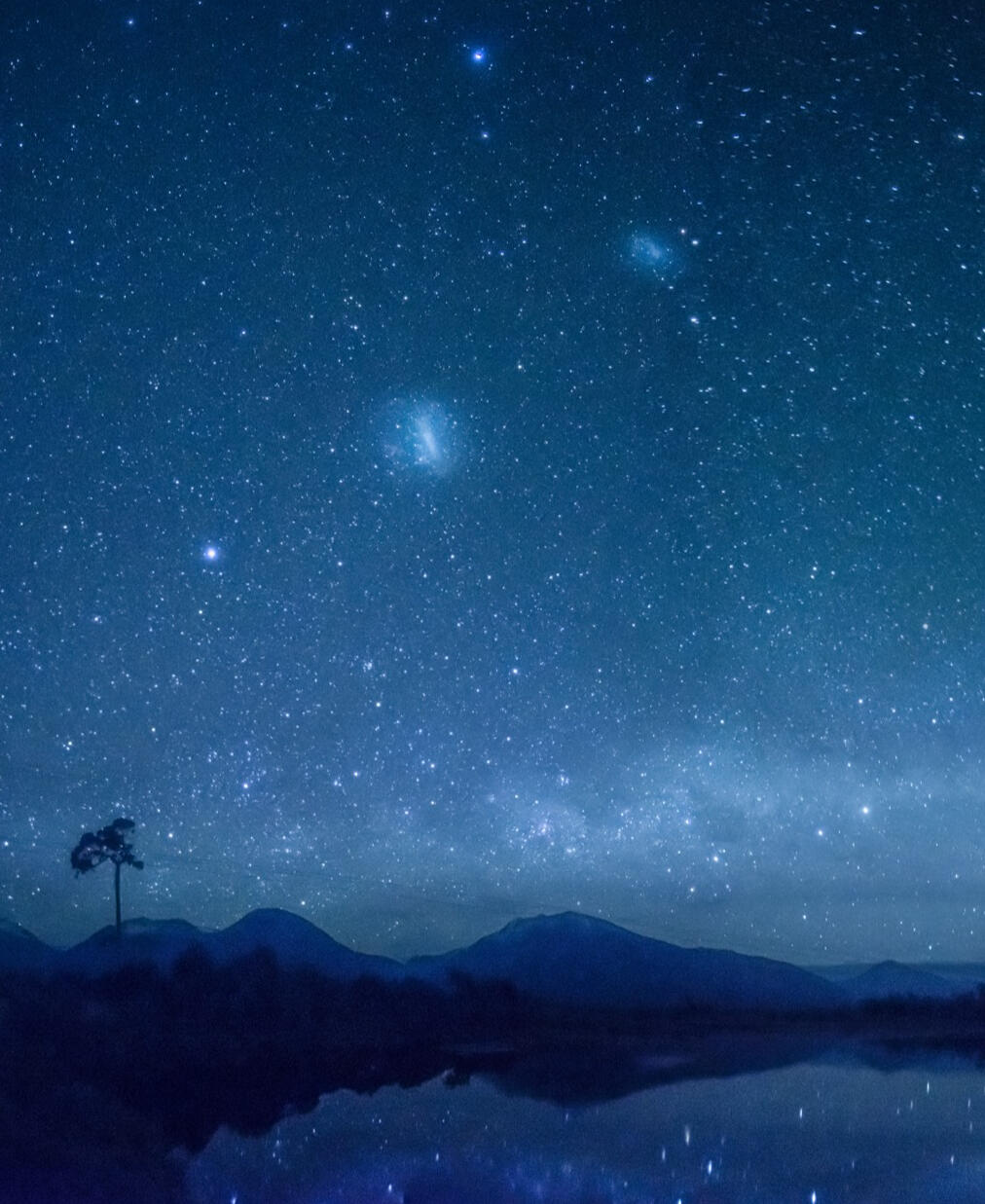 Three galaxies over the Haast River